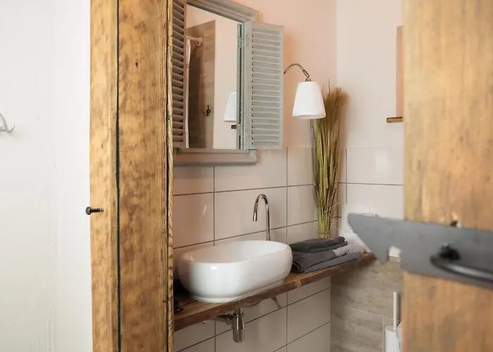 شقة Moments Cafe & Apartmenthaus *